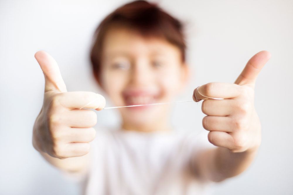 Simple Ways to Help Kids Establish a Flossing Habit